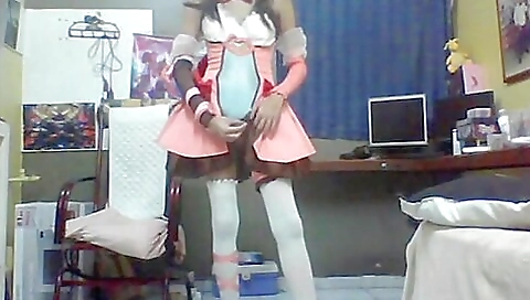 A small-tittied brunette with nice tits is naked and bareback