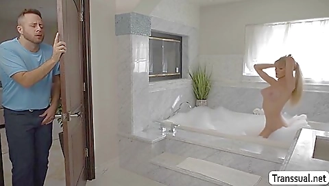 Blonde brunette with a massive cock licks his dick