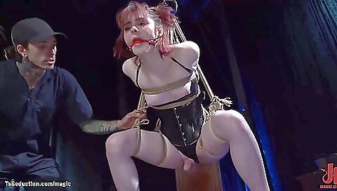 Red head with huge tits gets nailed by her bondage master